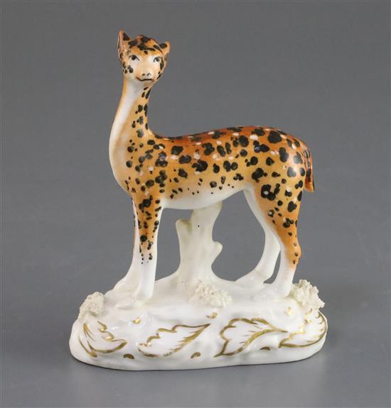 A Staffordshire porcelain figure of a giraffe, c.1828, H. 11.6cm